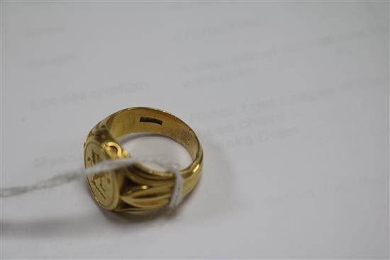 An 18ct gold signet ring with crest-engraved matrix, size N.